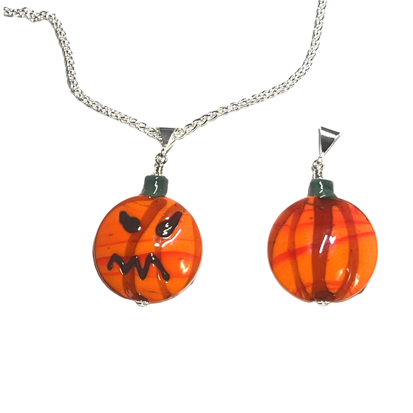 Pumpkin-shaped pendant necklace on a white background