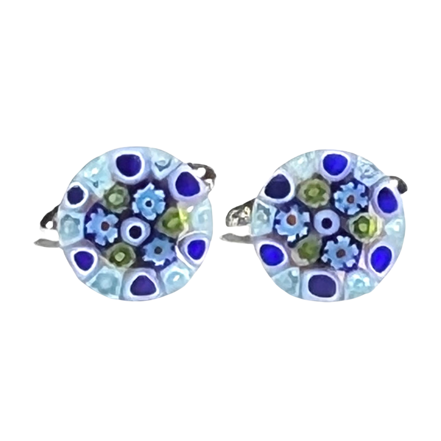 Pair of round cuff links with floral design on a white background
