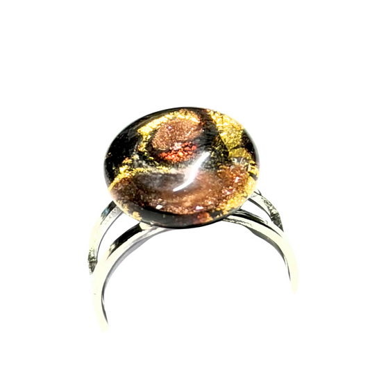Ring with a round, multicolored Murano glass on a white background