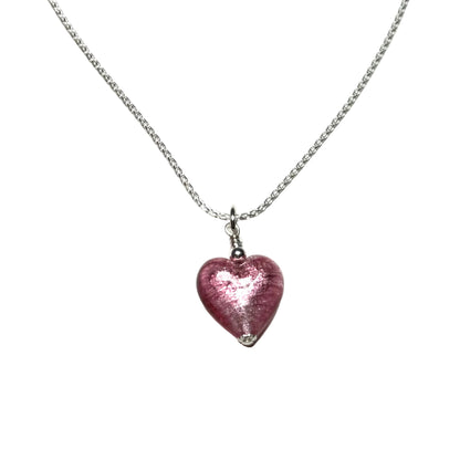 Necklace with a pink heart-shaped pendant on a white background