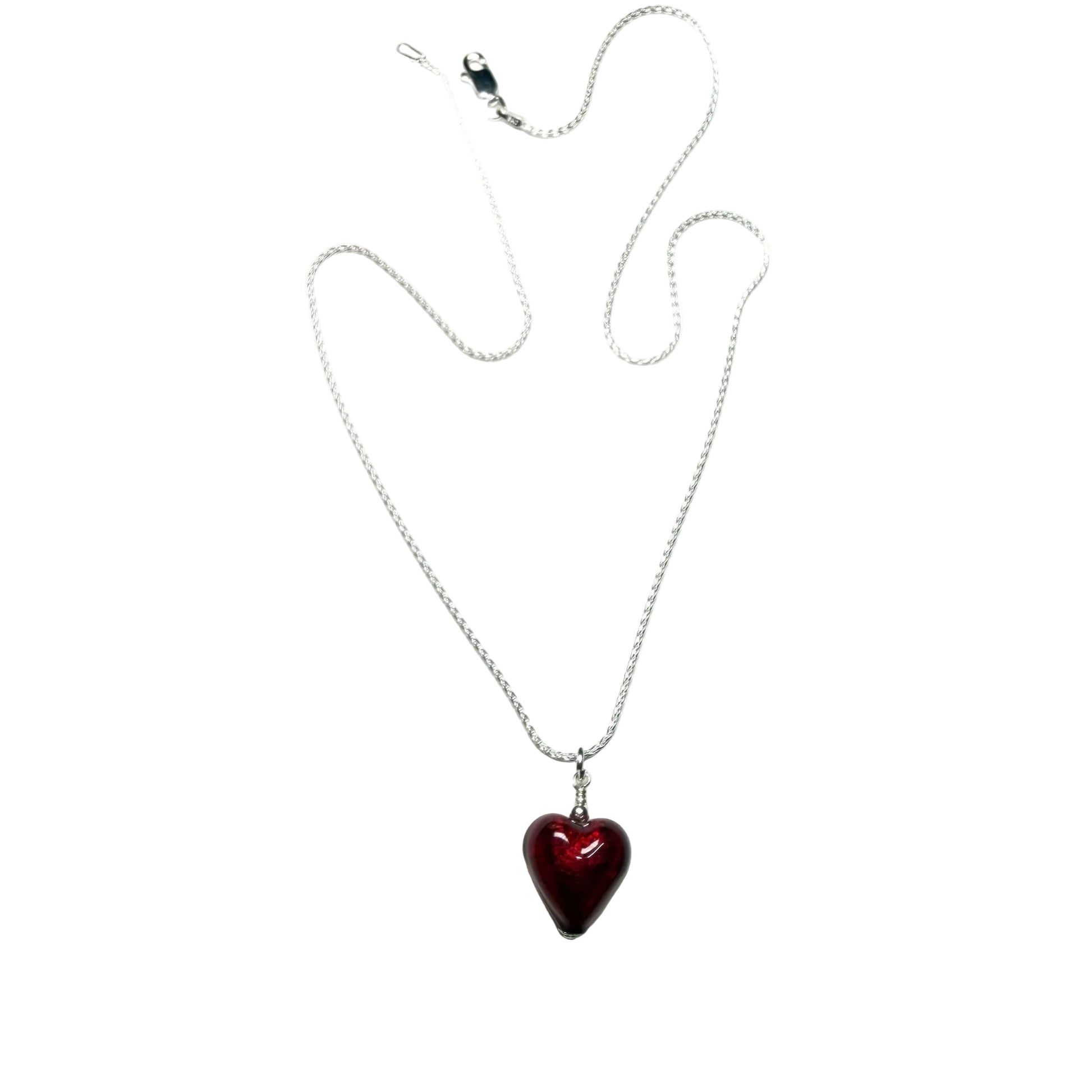 Necklace with a red heart pendant on a white background