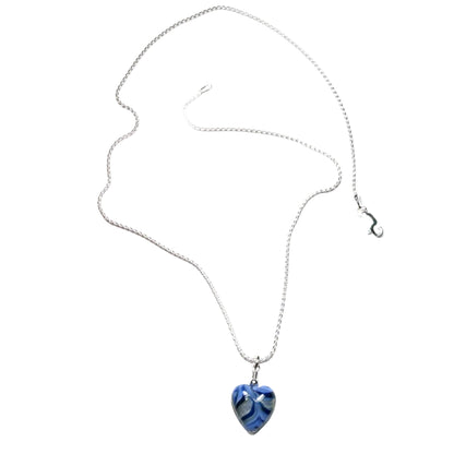 Necklace with a blue heart-shaped pendant on a white background