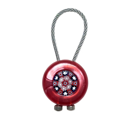 Murano red millefiori keychain with a pattern on a white background