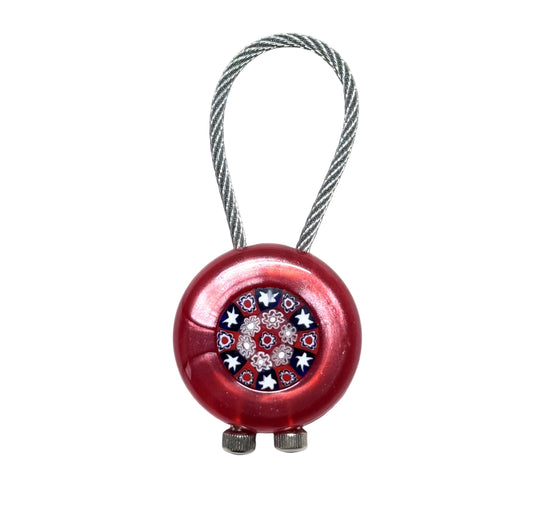 Murano red millefiori keychain with a pattern on a white background