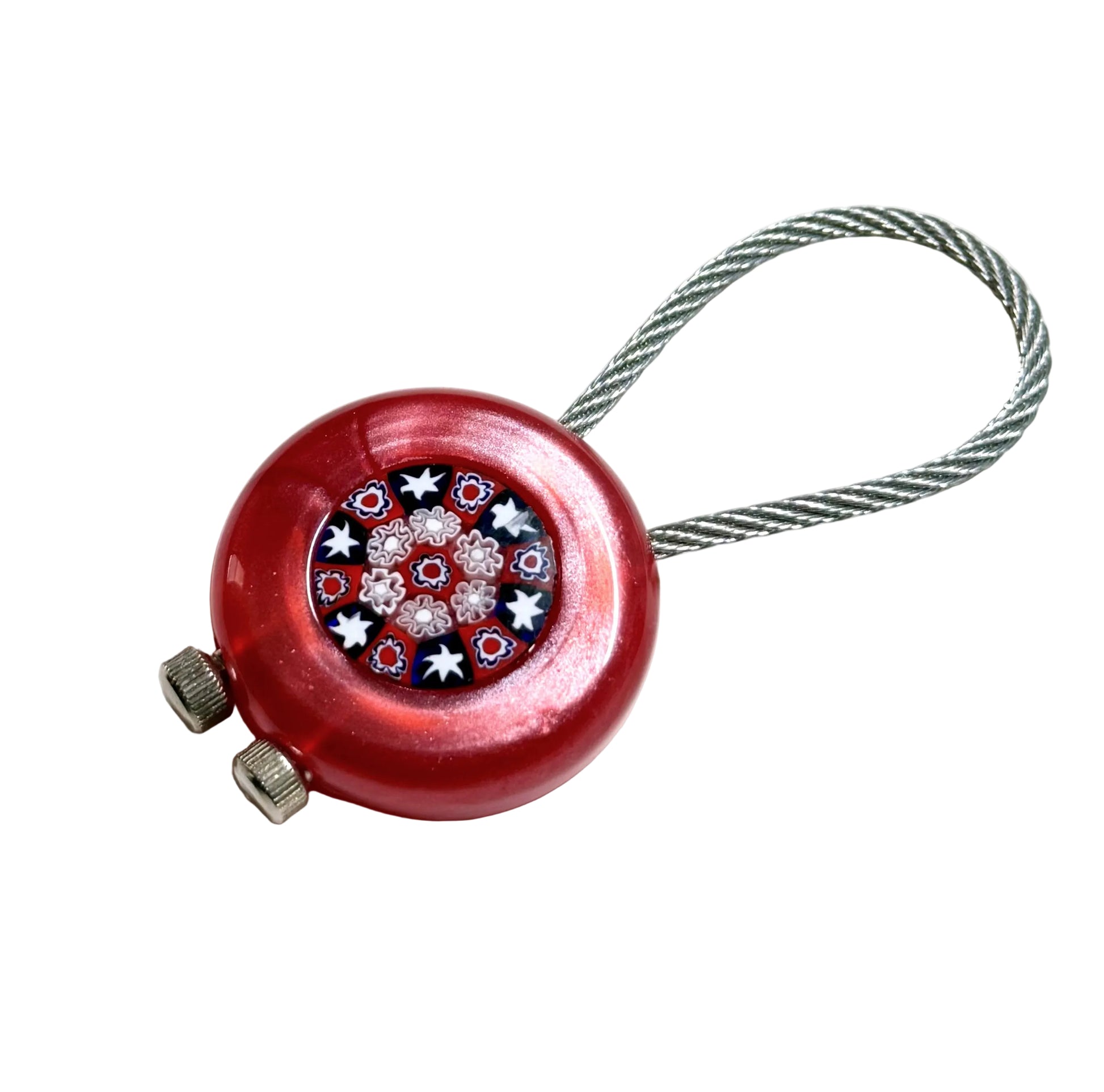 Red keychain with a decorative center on a white background
