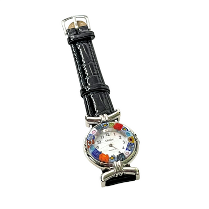 a watch with a multicolored face on a black strap