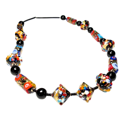 Colorful beaded necklace with black accents on a white background