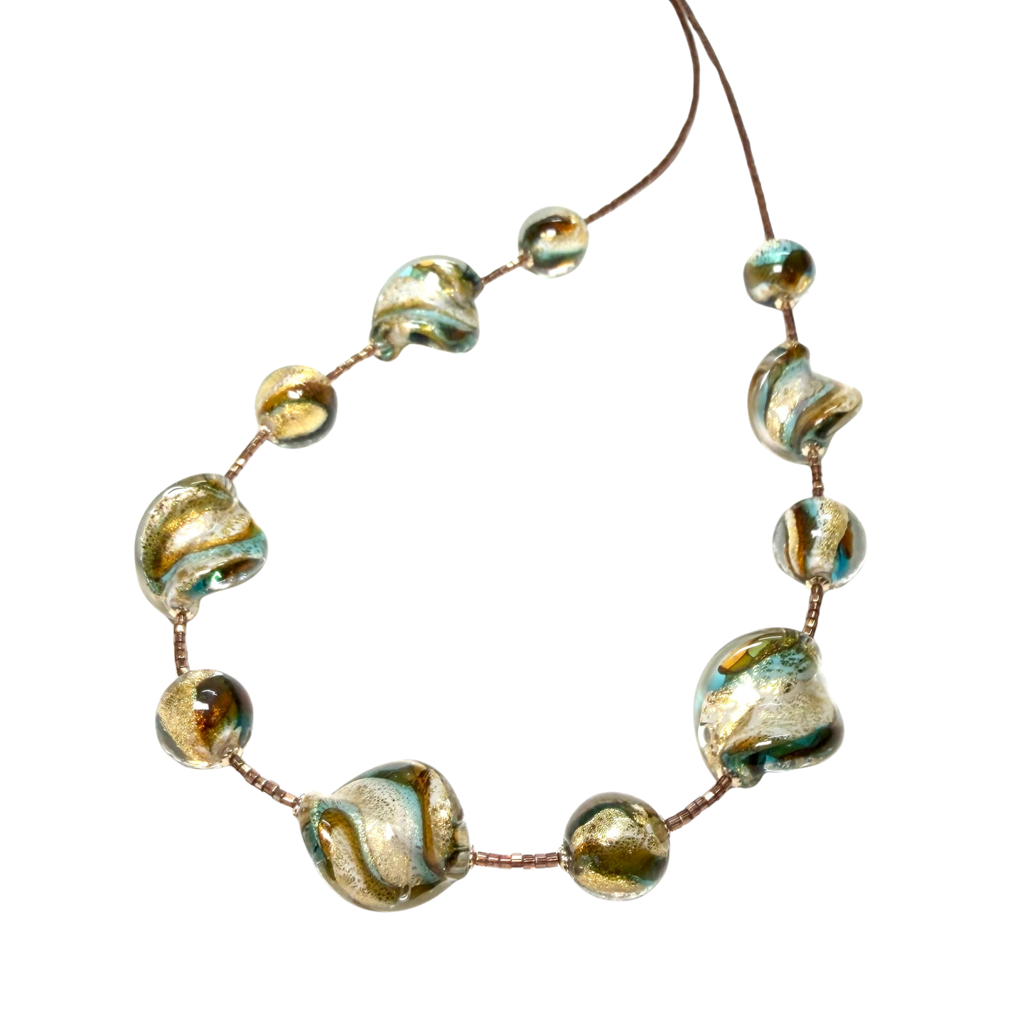 Necklace with gold and green beaded design on a white background