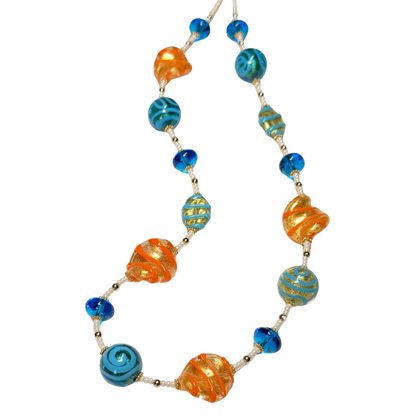 Necklace with blue and orange beads on a white background