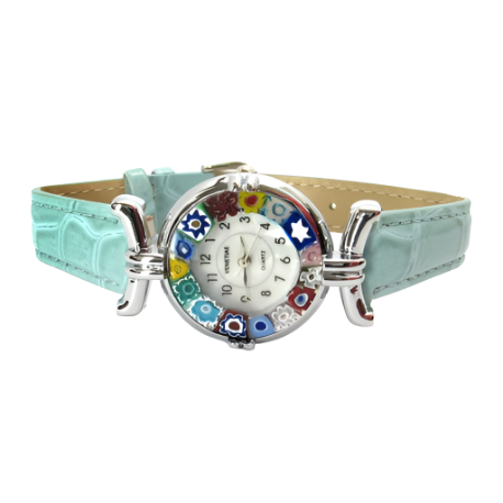 a white watch with a blue strap