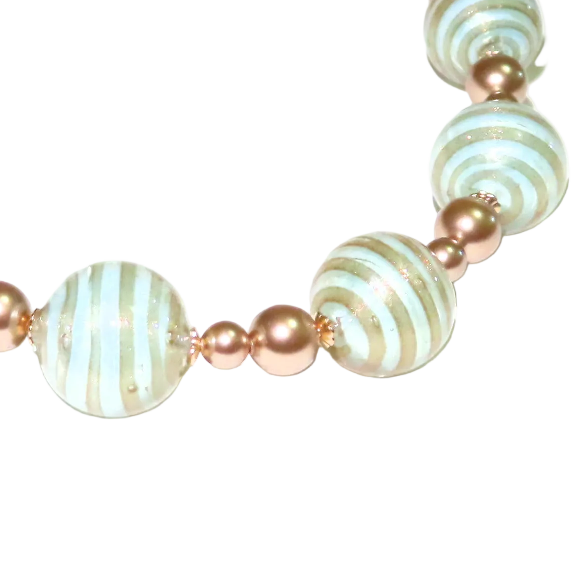 Bracelet with aquamarine and gold beads on a white background