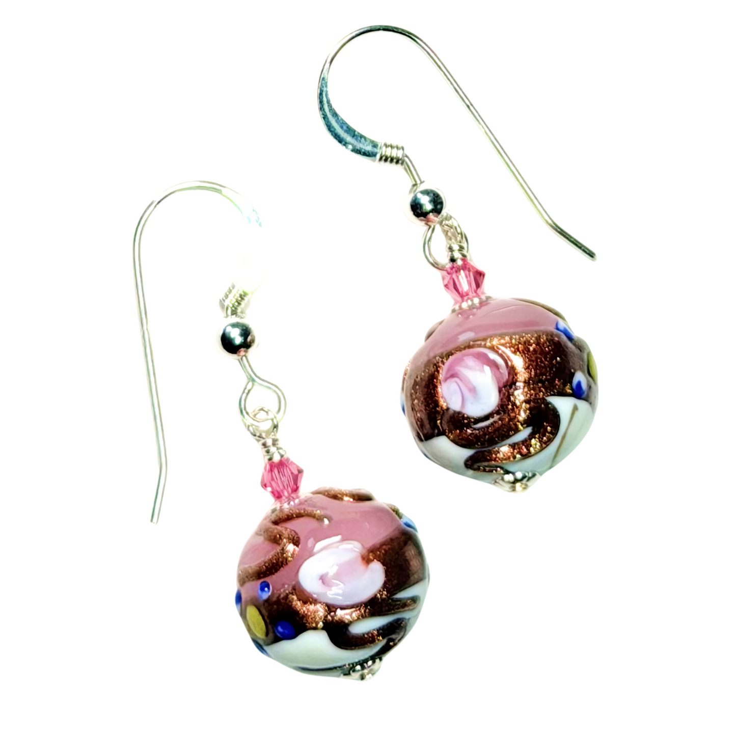 Pair of Murano glass bead earrings with pink and white colors on a white background
