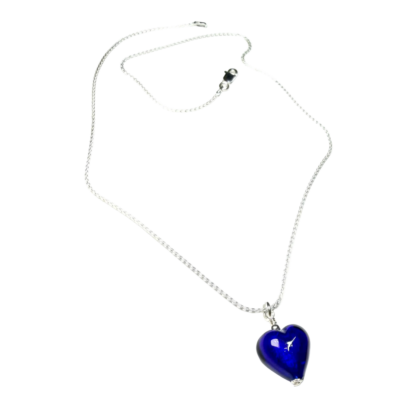 Necklace with a blue heart-shaped pendant on a white background