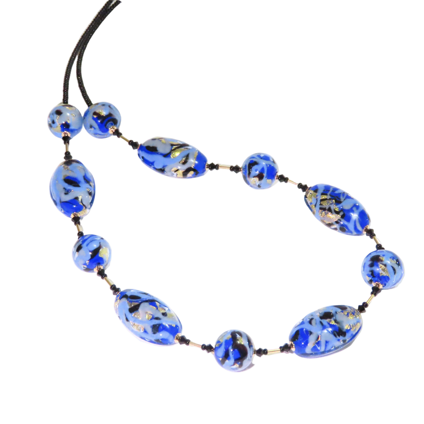 Necklace with blue black gold beads on a white background