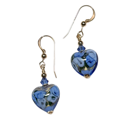 A pair of handmade glass heart drop earrings with blue roses heart glass beads, shown on a plain white background.