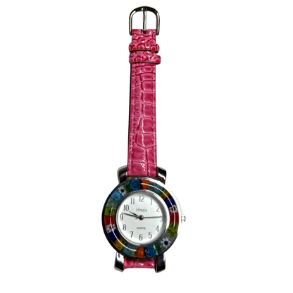 A women's watch featuring a vibrant pink crocodile-embossed strap and a round, multicolored mosaic bezel with a white dial.