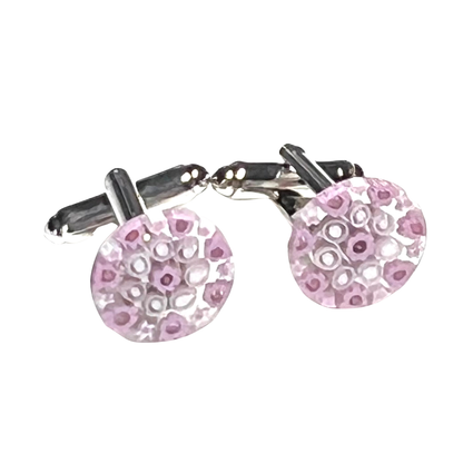 Cufflinks with pink round design on a white background