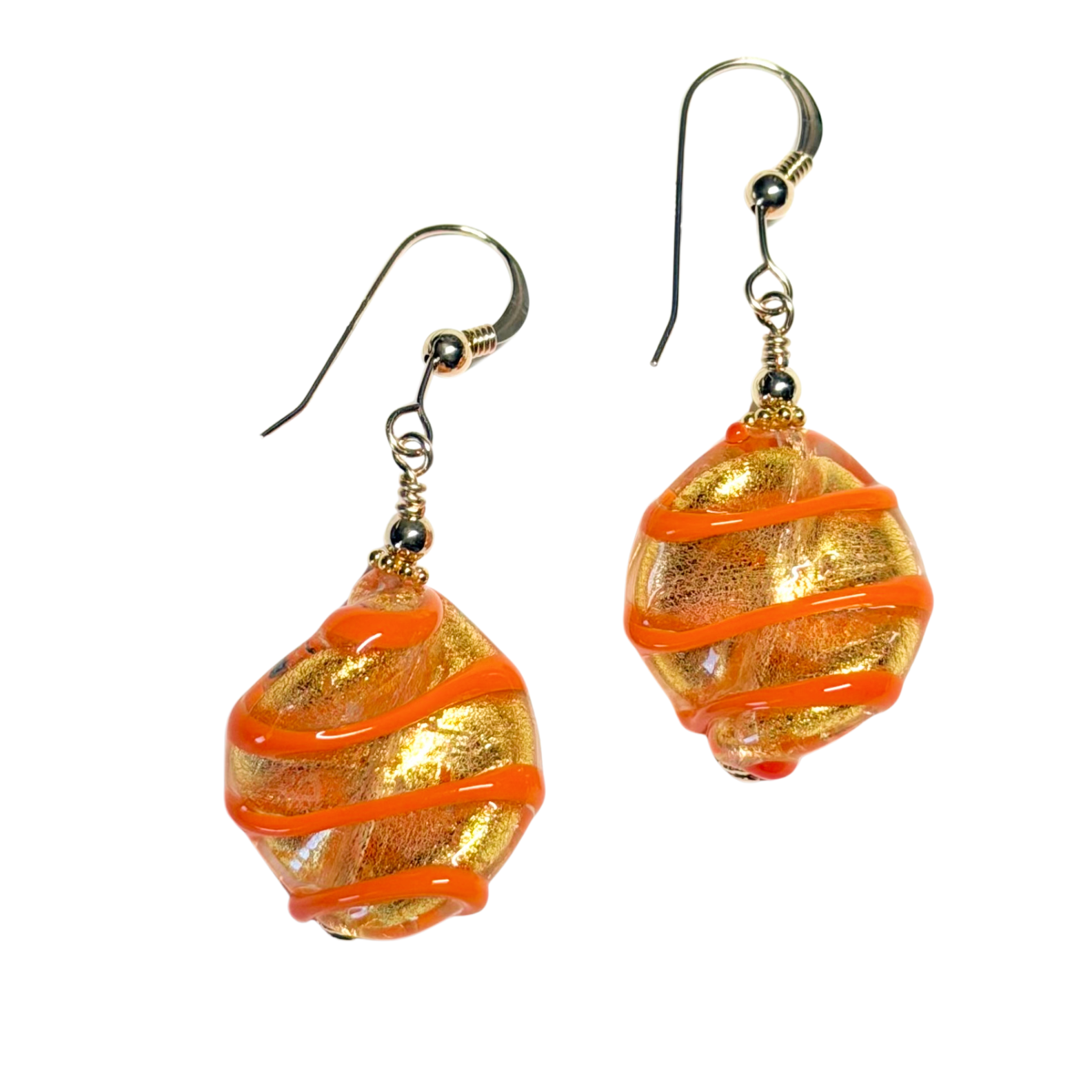 Pair of Murano glass orange and gold earrings on a white background