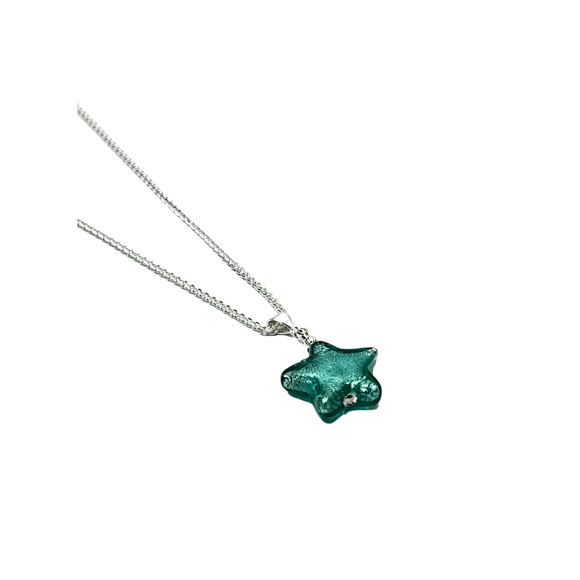 a necklace with a green flower on a chain
