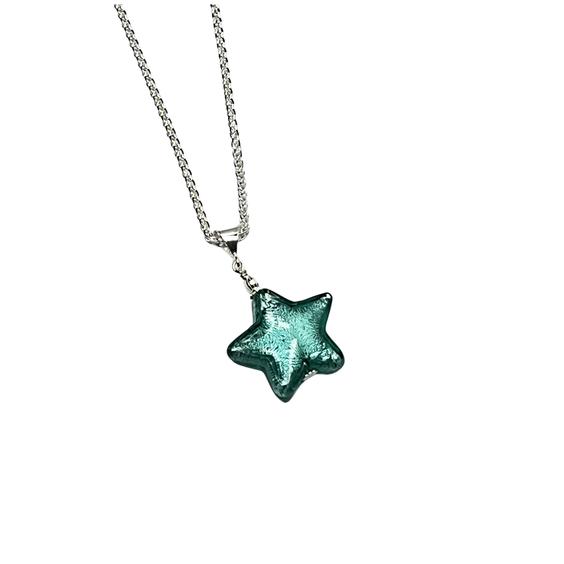 a necklace with a green star on it