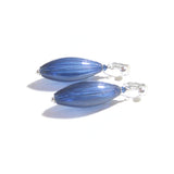 a pair of blue glass earrings on a white background