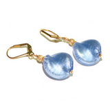 a pair of earrings with blue glass beads