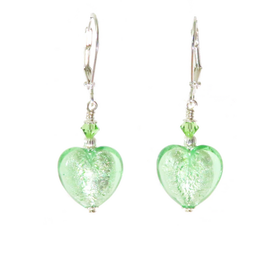 a pair of green glass heart shaped earrings